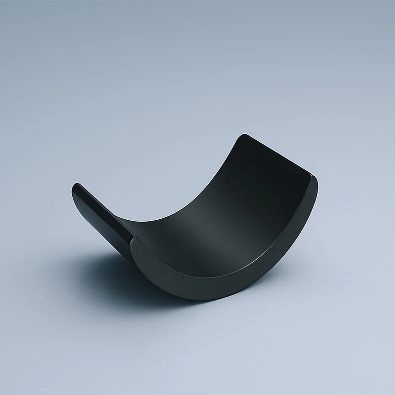 Ferrite magnet applications using curved segment magnets in electric motors